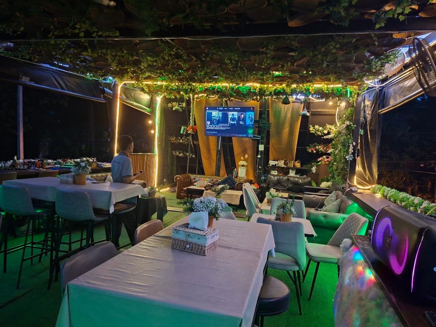 Jinny's Café and Bar indoor lounge at night
